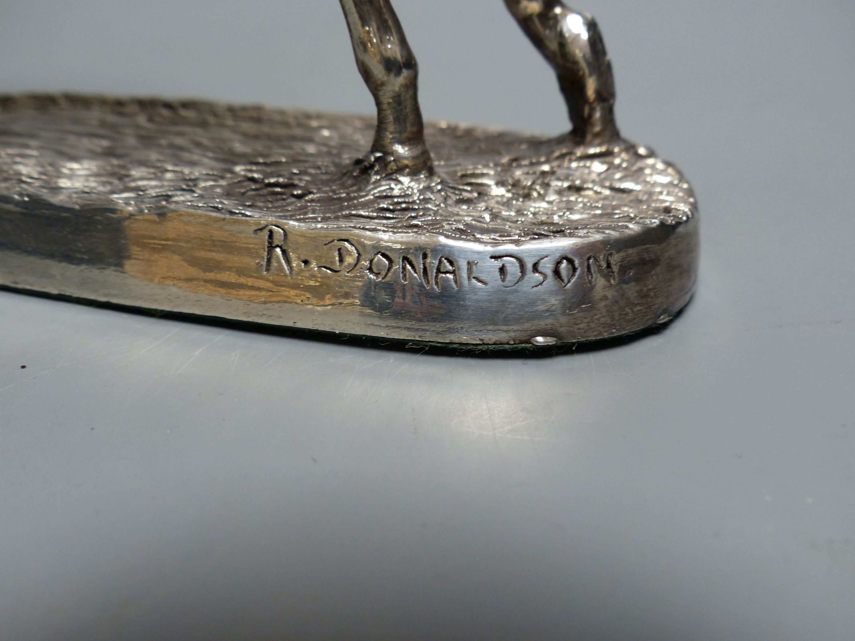 A modern silver mounted model of a racehorse and jockey, after R. Donaldson